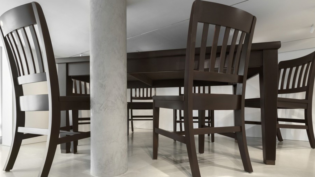 In both Robert Therrien&rsquo;s work and LeDray&rsquo;s MENS SUITS, scale and detail act in an inverse fashion. When something is blown up, all the details are scaled up and cease to be details. When something is scaled down, it encourages the viewer to lean in&nbsp;and look more closely. In Therrien&rsquo;s 1994 piece, Under the Table, the surface of the oversized table and chairs seems far&nbsp;less detailed than it would if the same amount of detail were depicted in a piece a tenth of the size.